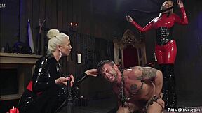 latex femdoms whip tattooed slave bound