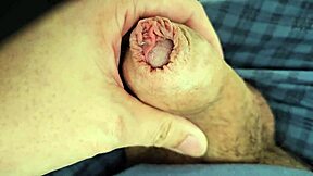 Lots of precum while edging my unique cock in this homemade solo session.