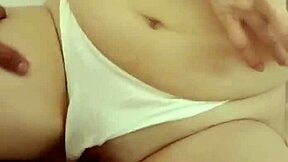 mature latina enjoys family time while dad works at home