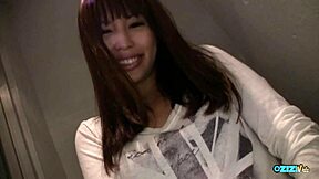 I approched the asian girl masturbatin in the buildin hallway