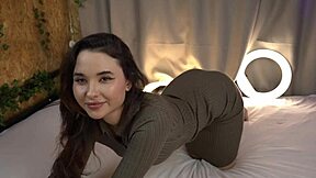 Flexible girl licks her own pussy and squirts wildly