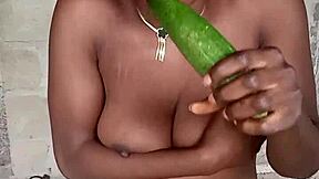 big clit pussy lips drip as upside-down cucumber drives screams