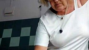 granny slut fucks her hairy pussy hard german style