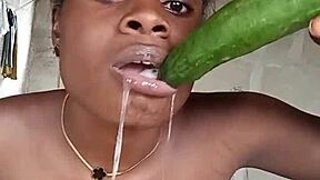 big clit pussy lips drip as upside-down cucumber drives screams