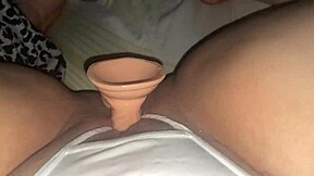 Latina shoves dildo through white panties deep into wet pussy lips closeup