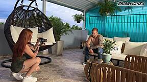 Horny redhead photographer Andrea Castro tempts with big tits