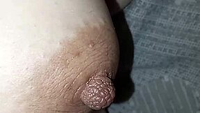 she flashes her huge tits and round belly on the street