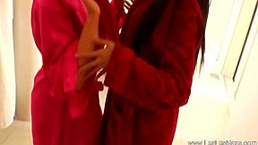 lesbian lovers tease each other in steamy bathtub