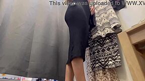 a curvy milf browses outfits trying dresses shorts in secret spy footage