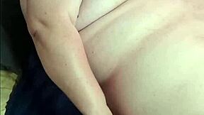 Chubby beauty teases with solo toy vibes on huge natural tits