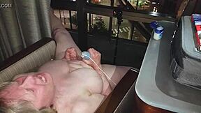 Ever seen granny naked masturbating over city lights?