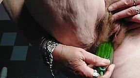 oma, why fuck your hairy granny pussy with that big cucumber