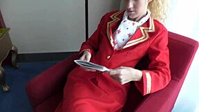 Feeling the Thrill as Air Hostess Monique Woods Poses in Uniform on Bed