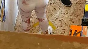 he spots her leggings split wide open as she bends revealing everything