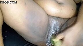 wanna see this ebony babe stretch her big pussy lips with a huge cucumber?