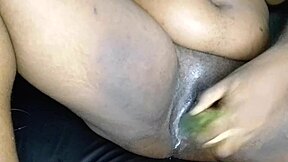 wanna see this ebony babe stretch her big pussy lips with a huge cucumber?