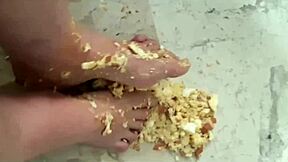 Coolmarina's tired feet massaged with hard-boiled eggs on the floor