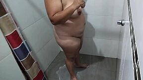 i put hidden cam in stepmom bathroom she showers touches big tits wet pussy groping homemade delight