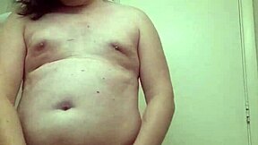 Seductive transsexual shemale teases in panties crossdressing striptease rips clothes off