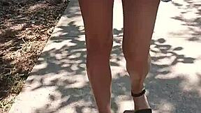 Look at this milf flashing her ass publicly on the street naked.