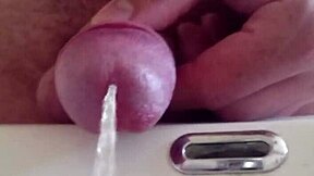 close-up fetish slut pisses wildly in the sink dripping everywhere