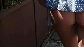 Look at this milf flashing her ass publicly on the street naked.