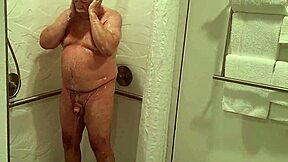 Grandpa showers naked flashing mature body in bathroom solo