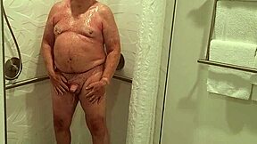 Grandpa showers naked flashing mature body in bathroom solo