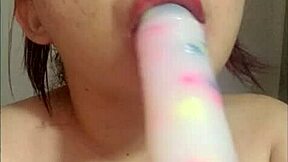 Curvy Colombian cutie shows off dildo sucking skills solo