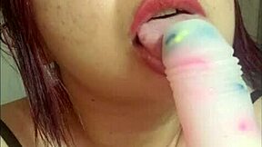 Curvy Colombian cutie shows off dildo sucking skills solo