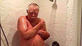 Grandpa showers naked flashing mature body in bathroom solo