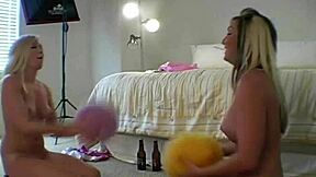 Blondes Play Nude Ball Game in Steamy Lesbian Photoshoot Backstage