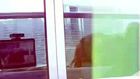 busty redhead teases huge tits nipples on public balcony strip lingerie