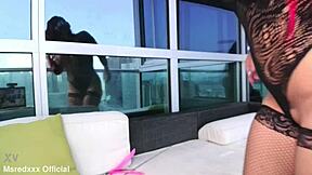 busty redhead teases huge tits nipples on public balcony strip lingerie