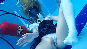 skinny latina ashlee rose teases natural tits underwater pool scuba sexy?