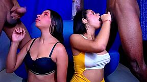 Two eager street whores kneel down for intense blowjobs from big cocks