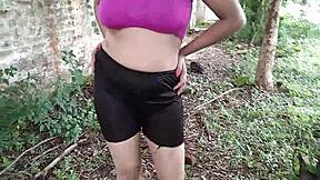 indian stepmom fingers oiled pussy with bottle deep in jungle outdoors?