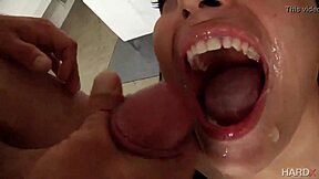 her mouth overflowing with six thick loads from gangbang bukkake orgy
