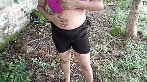 indian stepmom fingers oiled pussy with bottle deep in jungle outdoors?