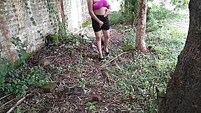 indian stepmom fingers oiled pussy with bottle deep in jungle outdoors?