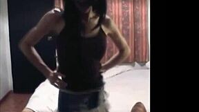 Thai Ladyboy Dances in Jeans Skirt Revealing Huge Cock