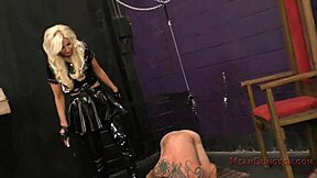 brittany andrews towers over her slave worshipping her ass in total femdom bdsm control