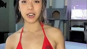 Woman Poses In Bikini At Pool