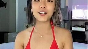 Woman Poses In Bikini At Pool