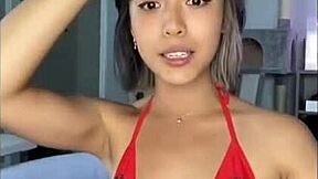 Woman Poses In Bikini At Pool