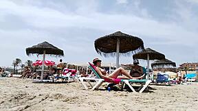 brunette's huge tits bounce wildly on beach part 2!