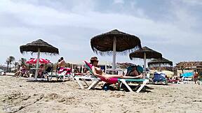 brunette's huge tits bounce wildly on beach part 2!