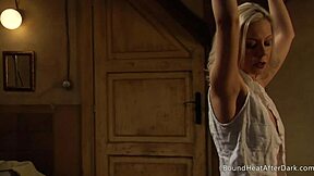 Bent over, the bound lesbian slave gets her wet pussy pounded deep by a massive strapon