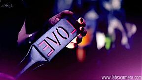 inked pink-haired mistress toys brunette slave's ass in fishnets