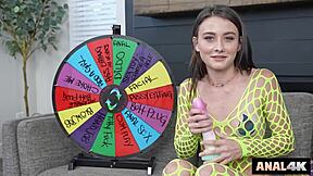 anal slut spins wheel to stretch her hole